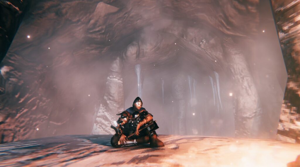 Screenshot from the game Valheim, my char is sitting inside a cold cave, with a fire going.